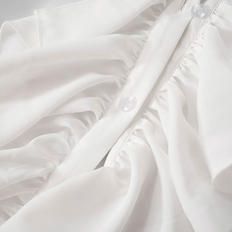 Long flared sleeve ruched ruffle button solid top