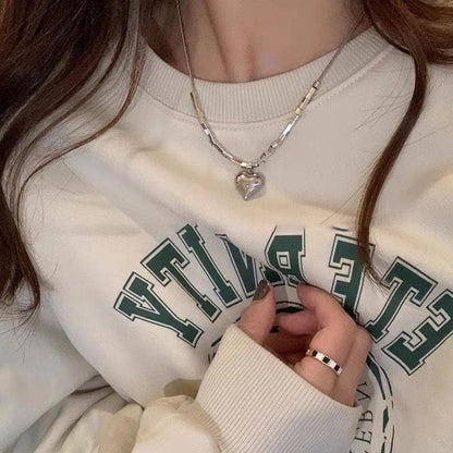 Heart pendant beaded metal chain necklace