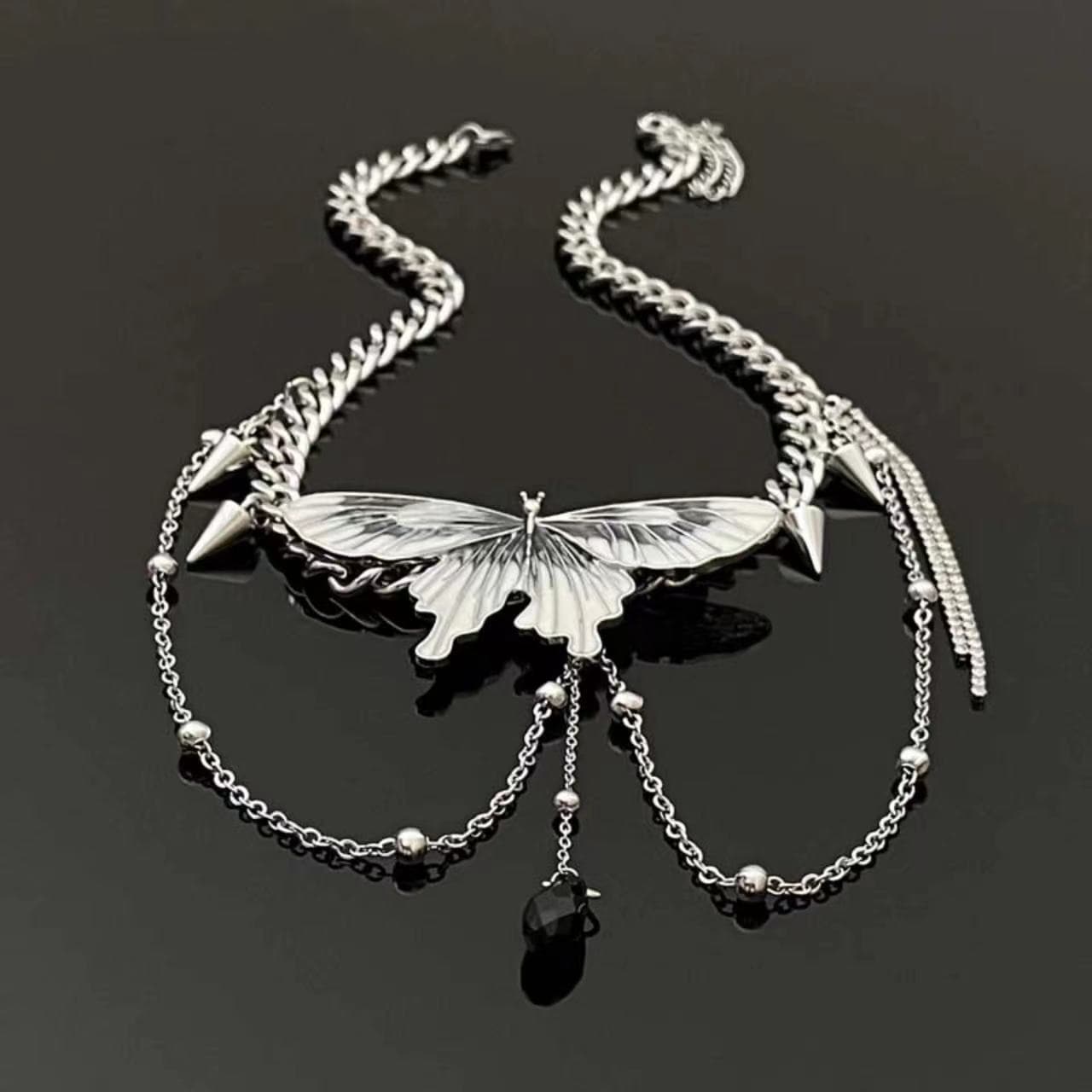 Butterfly rivet pendant necklace