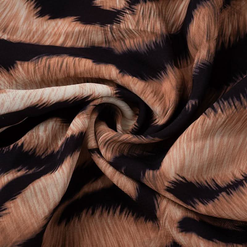 Slit long flared sleeve self tie tiger print cowl neck top