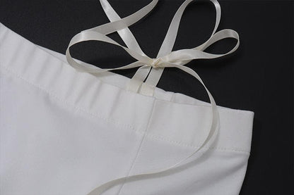 Self tie off shoulder long sleeve solid top