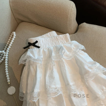 Reagen Tiered Bow Mini Skirt