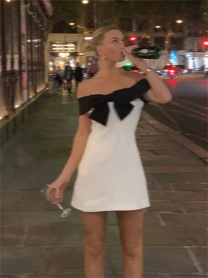 Off Shoulder Oversized Bow Wrap Bodycon Mini Dress