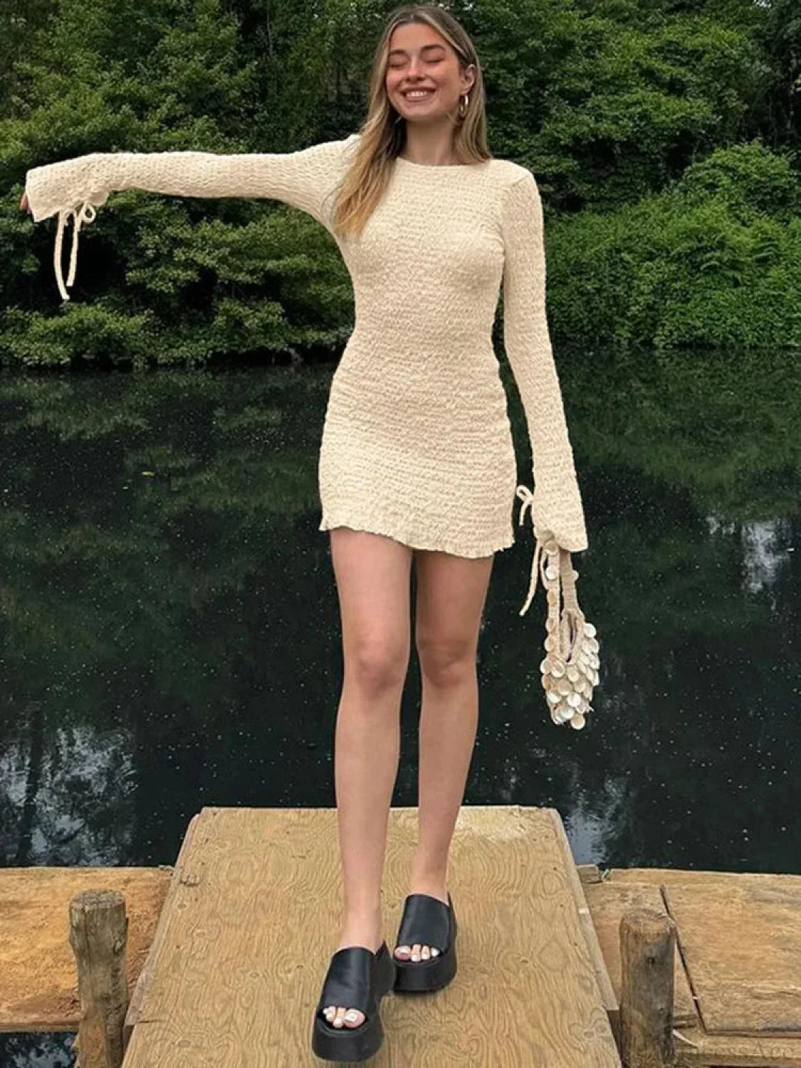 Long Sleeve Crinkled Texture Open Back Ruffle Hem Mini Dress