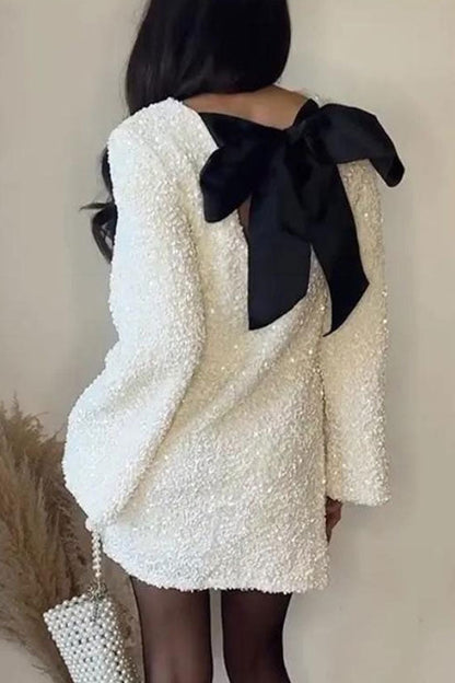 Textured Applique Open Back Large Satin Bow Long Sleeve Mini Dress