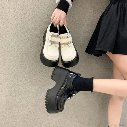 Water-resistant Leather Tall Platform Sneaker
