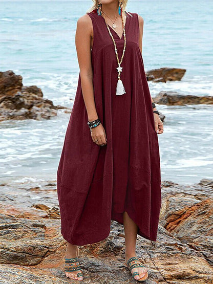 Deep V-Neck Sleeveless Asymmetric Hem Pocket Maxi Dress